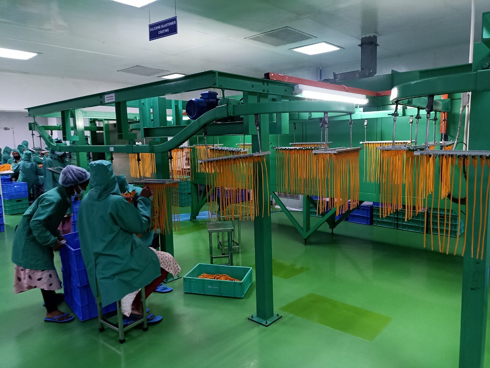 Overhead power-and-free conveyor line built by Wellman